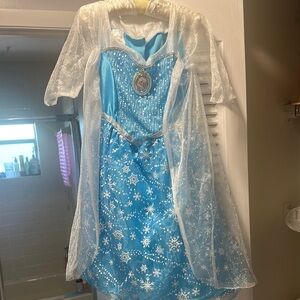 Disney’s Queen Elsa’s light up singing Frozen dress with cape, fits sizes 4-6x